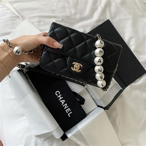 chanel handbag gold chain|chanel bag with pearl chain.